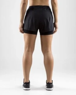 Craft Essential 2-in-1 Hardloop Short Zwart Dames -Zwemartikelen Winkel 1906029 999000 essential 2 in 1 shorts c3